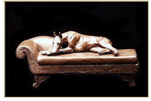 Doberman - Sleeping on Chaise Lounge